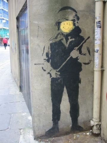 Graffiti Cop von banksy 
